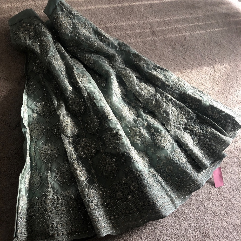 Sea green stone work lehenga